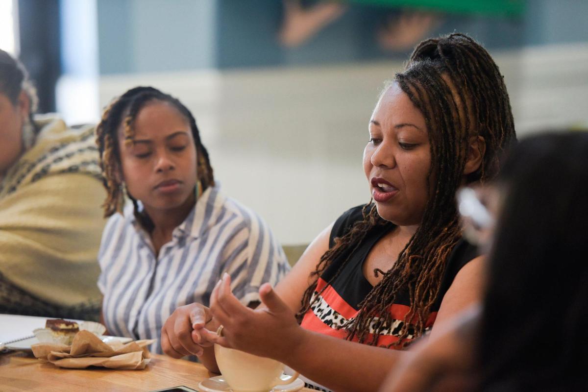 Kira Kimball leads other doulas in a discussion about how to improve their services a solicit advice from each other on Tuesday, July 11, 2023 at Amélie’s French Bakery & Café. Black North Carolinians in 2021 were more than twice as likely to die from pregnancy-related complications than white residents, according to a News & Observer and Charlotte Observer analysis.