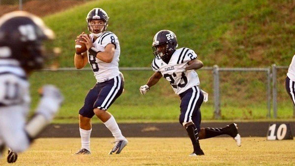 East Mecklenburg quarterback Trey Truitt is a Charlotte Observer high school player of the week.