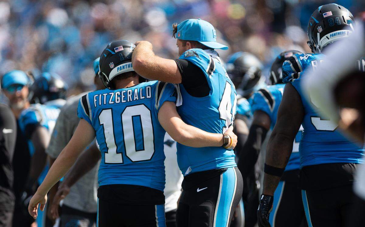 Carolina Panthers kicker Ryan Fitzgerald celebrates with Carolina Panthers long snapper JJ. Jansen at the Bank of America Stadium in Charlotte, N.C., on Sunday, September 21, 2025.