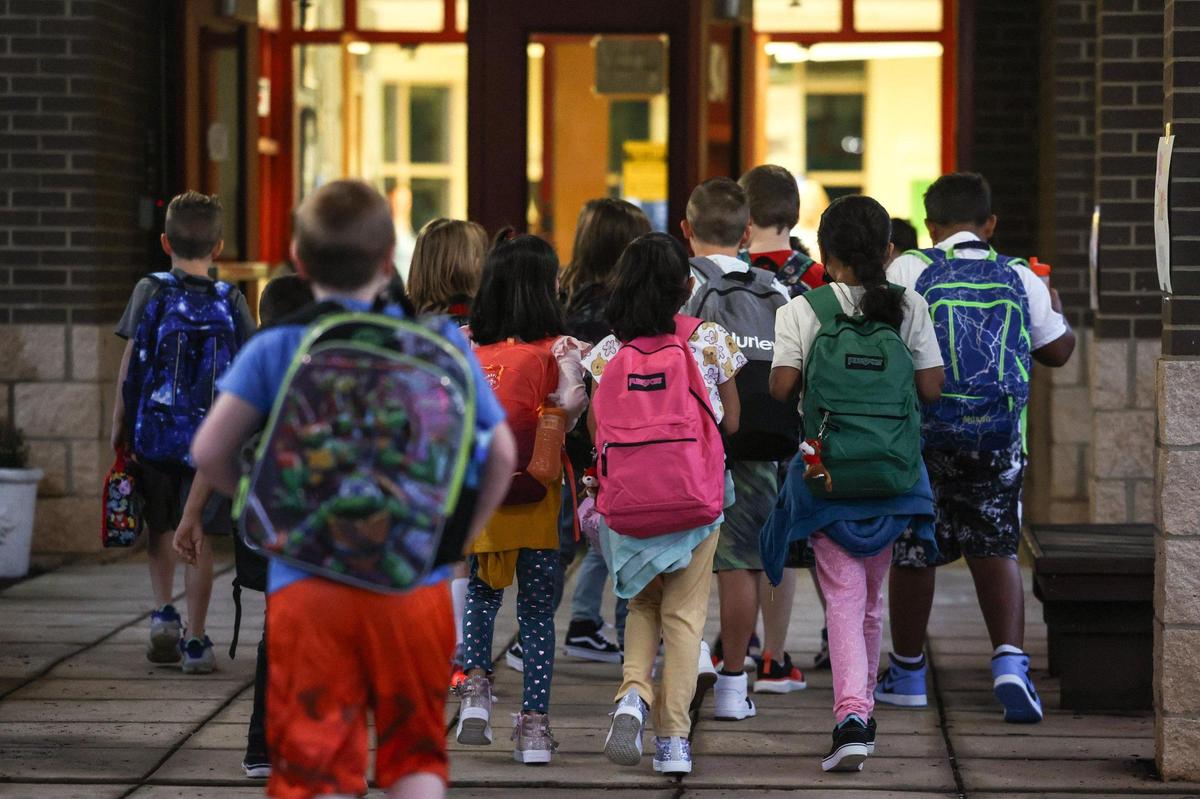 Students arrive for the first day of school at Waxhaw Elementary School on Monday, August 28, 2023.