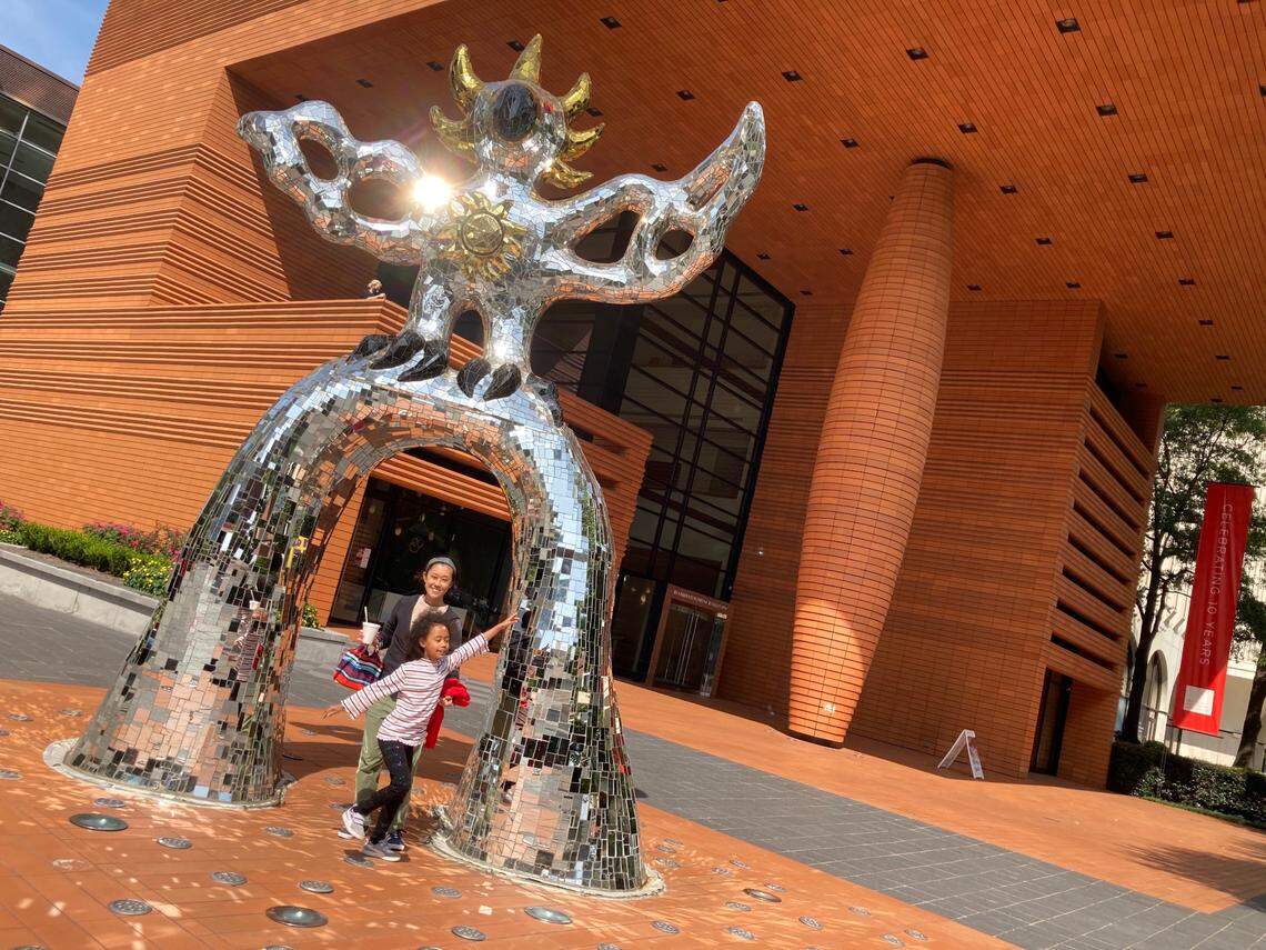 Tracy Jones’ wife and 7-year-old daughter outside the Bechtler Museum of Modern Art in Charlotte.