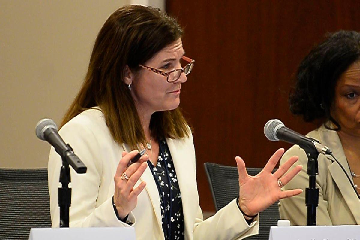 Jennifer Giovannitti, president of the Claude Worthington Benedum Foundation, speaks at a public hearing on the planned merger of BB&T and SunTrust on Thursday, April 25, 2019, at the Charlotte branch of the Federal Reserve Bank of Richmond.
