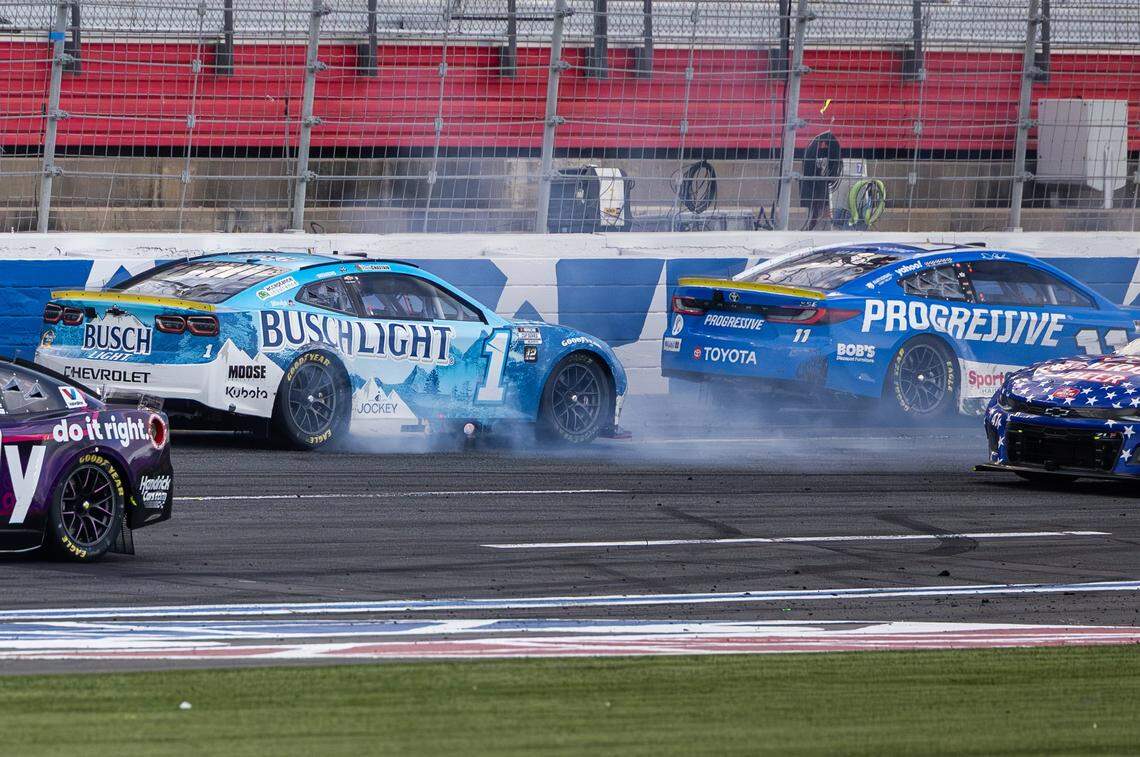 NASCAR Cup Series driver Ross Chastain (1) and NASCAR Cup Series driver Denny Hamlin (11) make their way to the finish line in reverse during the Bank of America Roval 400 with a burnout on Oct. 5, 2025, at Charlotte Motor Speedway.