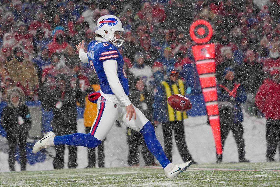 Dec 1, 2024; Orchard Park, New York, USA; Buffalo Bills punter Sam Martin (8) punts the ball against the San Francisco 49ers during the first half at Highmark Stadium. Mandatory Credit: Gregory Fisher-Imagn Images