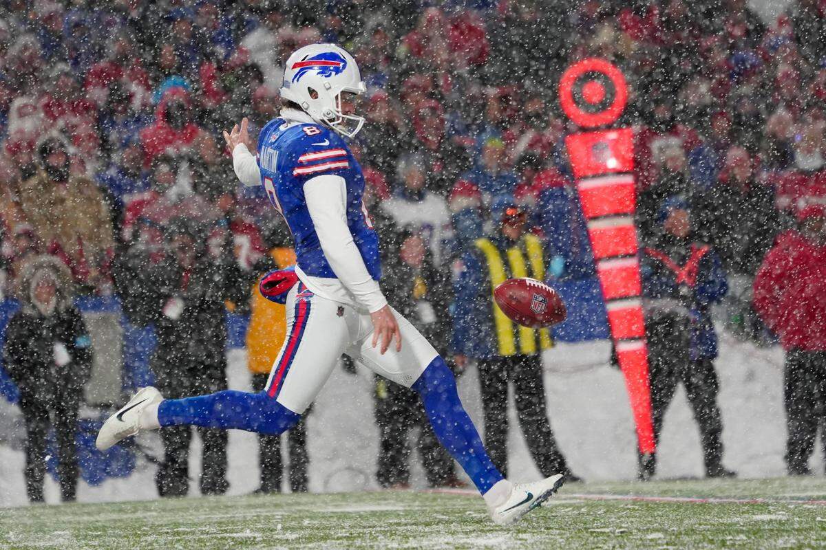 Dec 1, 2024; Orchard Park, New York, USA; Buffalo Bills punter Sam Martin (8) punts the ball against the San Francisco 49ers during the first half at Highmark Stadium. Mandatory Credit: Gregory Fisher-Imagn Images