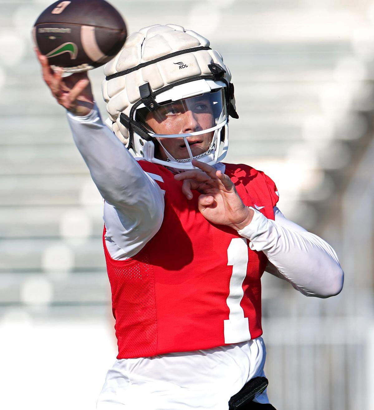 Charlotte 49ers quarterback Max Brown drops back to pass during the team’s first summer training camp practice on Friday, August 3, 2024.