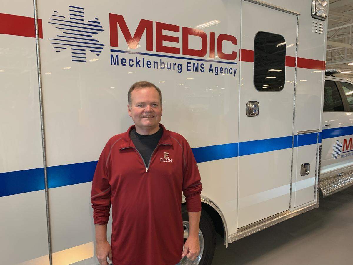 Cardiac arrest survivor Jeff Hayton in Charlotte with Mecklenburg MEDIC. 