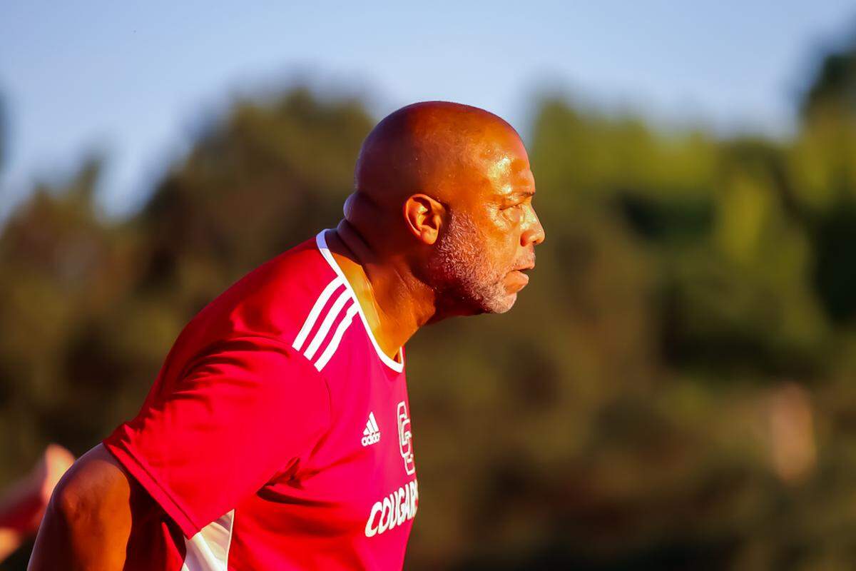 Charlotte Catholic head coach Gary Hoilett stands on the sideline during Thursday’s win at Ardrey Kell