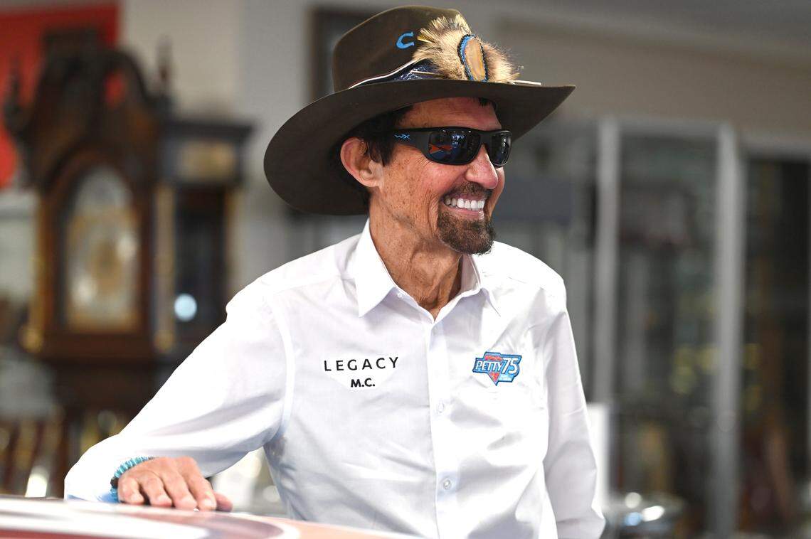 Former NASCAR driver and Hall of Fame member Richard Petty stands alongside one of his cars at The Richard Petty Museum in Level Cross, NC on Monday, January 29, 2024. Petty nicknamed “The King,” was the first driver to win the championship 7 times while recording 200 racing wins.