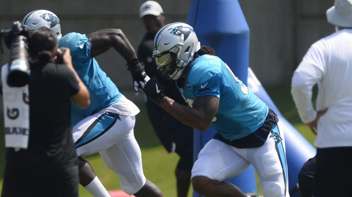 Carolina Panthers defensive end Julius Peppers (90), who has been easing back into practice after offseason shoulder surgery, was a full participant on Monday.