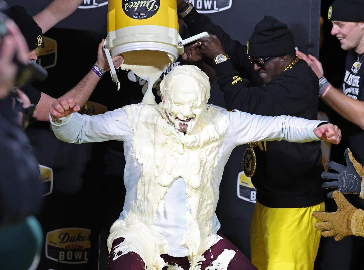 Minnesota Golden Gophers head coach P.J. Fleck is covered in Duke’s Mayonnaise following the team’s victory over Virginia Tech in the Duke’s Mayo Bowl at Bank of America Stadium in Charlotte, NC on Friday, January 3, 2025. Minnesota defeated Virginia Tech 24-10.