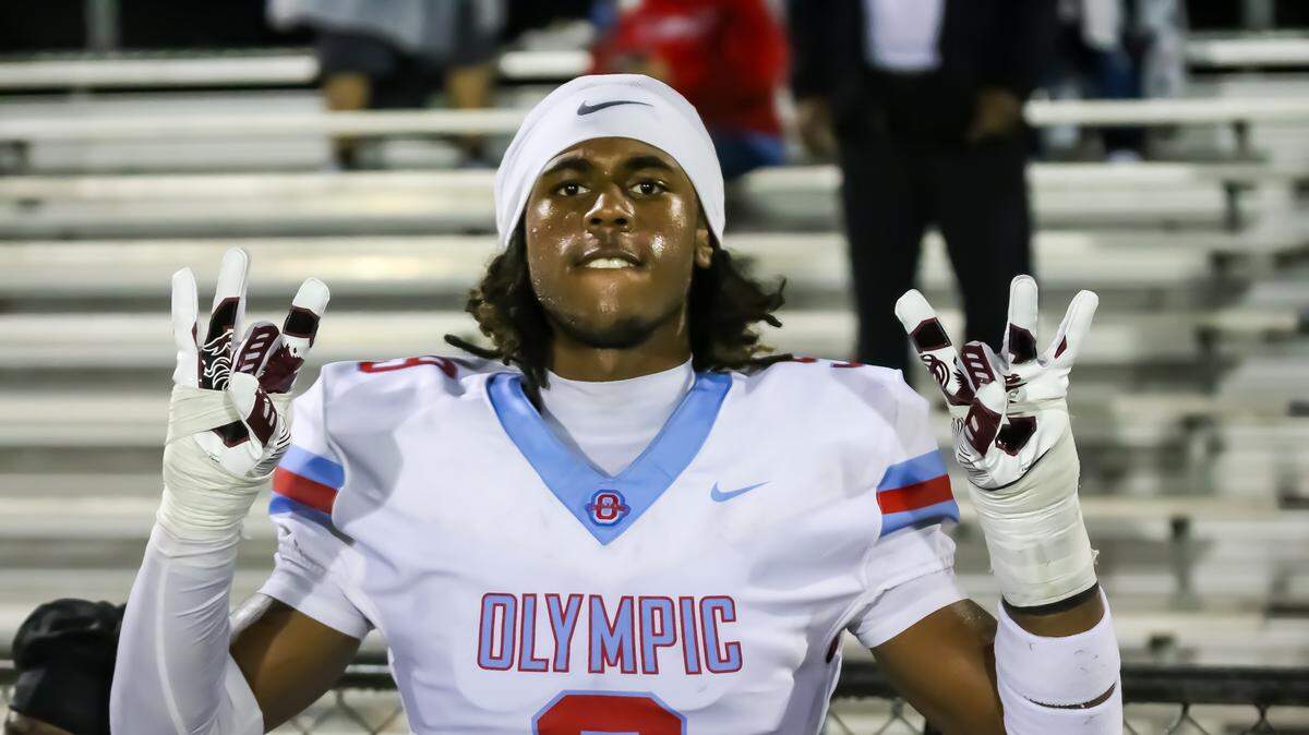 Olympic’s Qari Frazier celebrates after Olympic beat Central Cabarrus in Concord on Friday, Sept. 26, 2025.