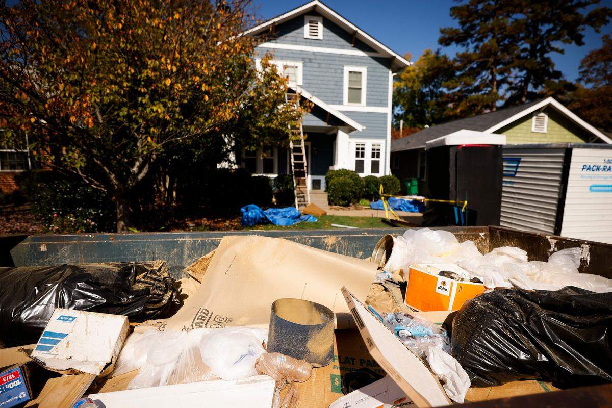 Debris from a home renovation sits in front of a home on Circle Avenue in Charlotte, N.C., Friday, Nov. 4, 2022.