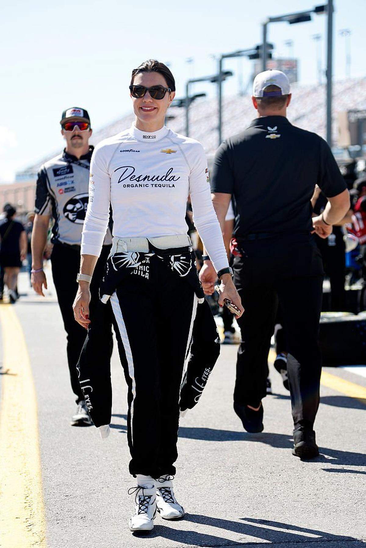 LAS VEGAS, NEVADA - OCTOBER 11: Katherine Legge, driver of the #78 Desnuda Chevrolet, walks the grid during practice for the NASCAR Cup Series South Point 400 at Las Vegas Motor Speedway on October 11, 2025 in Las Vegas, Nevada. (Photo by Logan Riely/Getty Images)