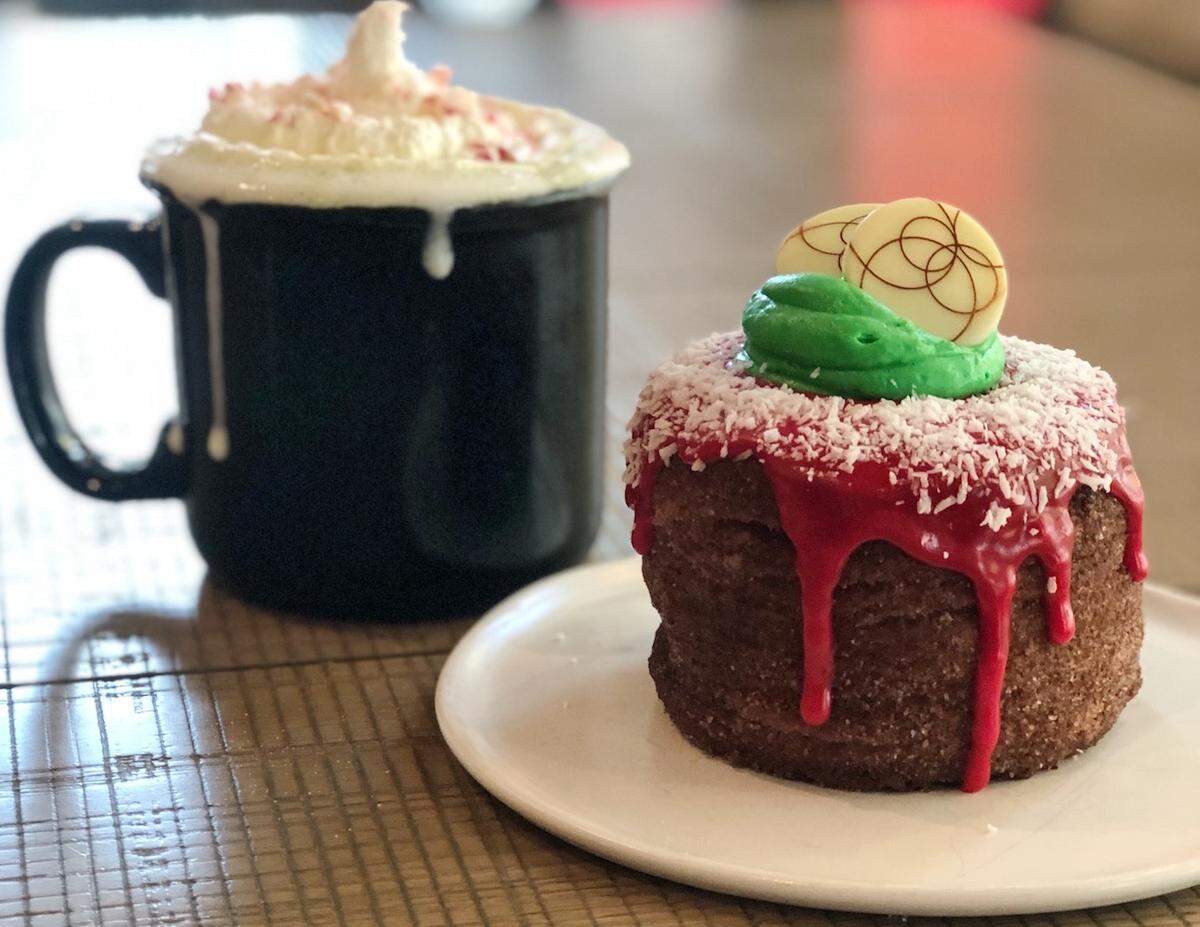 Coco and the Director’s seasonal Matcha-Eggnog Latte and a kronut.