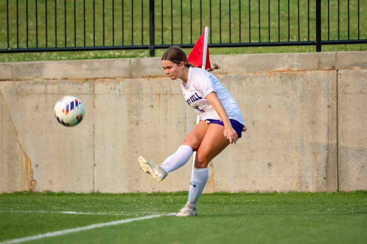 Ardrey Kell Rhyan Winnek takes a corner kick in the first half at the NCHSAA 4A state in Matthews NC at the Sportsplex on May 31. 202
