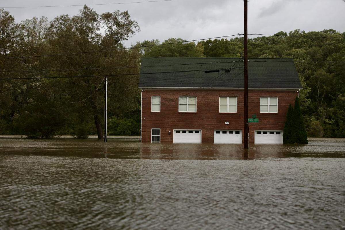 Residents in Charlotte’s Riverside Drive area were evacuated as water continued to rise Friday morning.