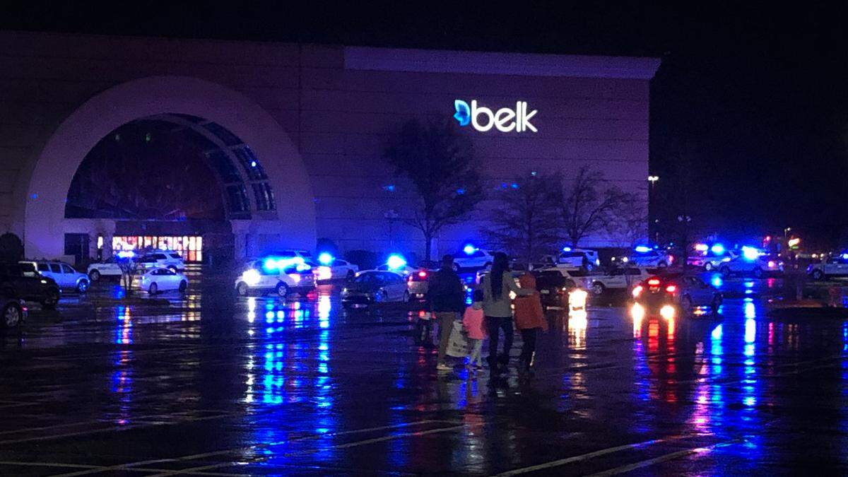 Emergency personnel fill a parking lot area at Carolina Place Mall in Pineville, NC on Thursday, December 24, 2020.