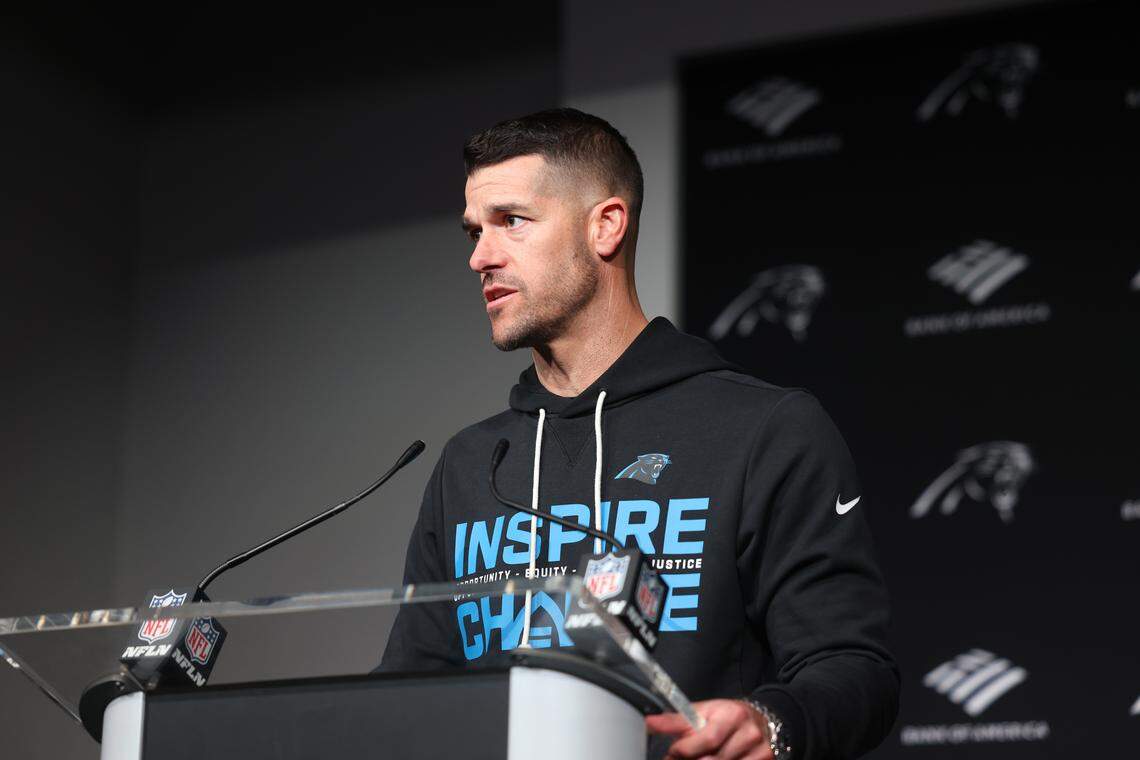 Carolina Panthers head coach Dave Canales speaks at a press conference Sunday after the Panthers defeated the Tampa Bay Buccaneers at Bank of America Stadium in Charlotte