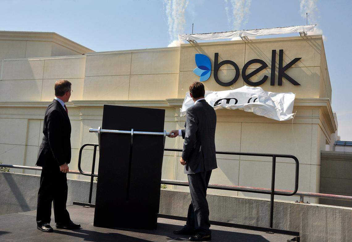 For decades, the name Belk was synonymous with Charlotte. Then-executives Tim Belk, left, and Johnny Belk, right, unveil the a Belk logo at Charlotte’s Southpark Mall in a 2010 file photo.
