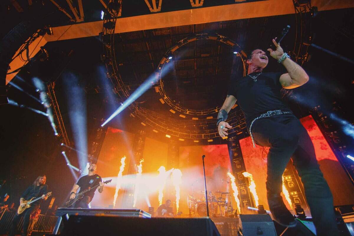 Lead singer Scott Stapp of Creed performs with the band at PNC Music Pavilion in Charlotte on Friday night.