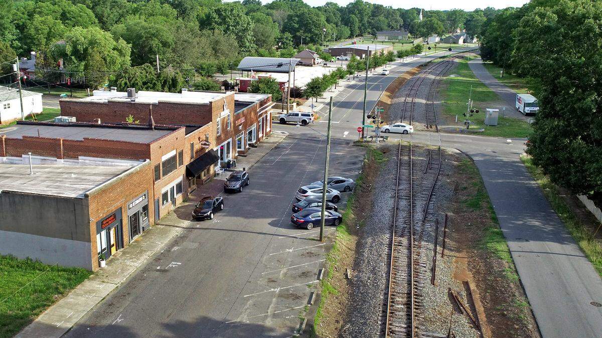 These railroad tracks through Huntersville could become the Red Line, a train line from uptown Charlotte to southern Iredell County. As part of that, Charlotte hopes to implement a sales tax to pay for construction.