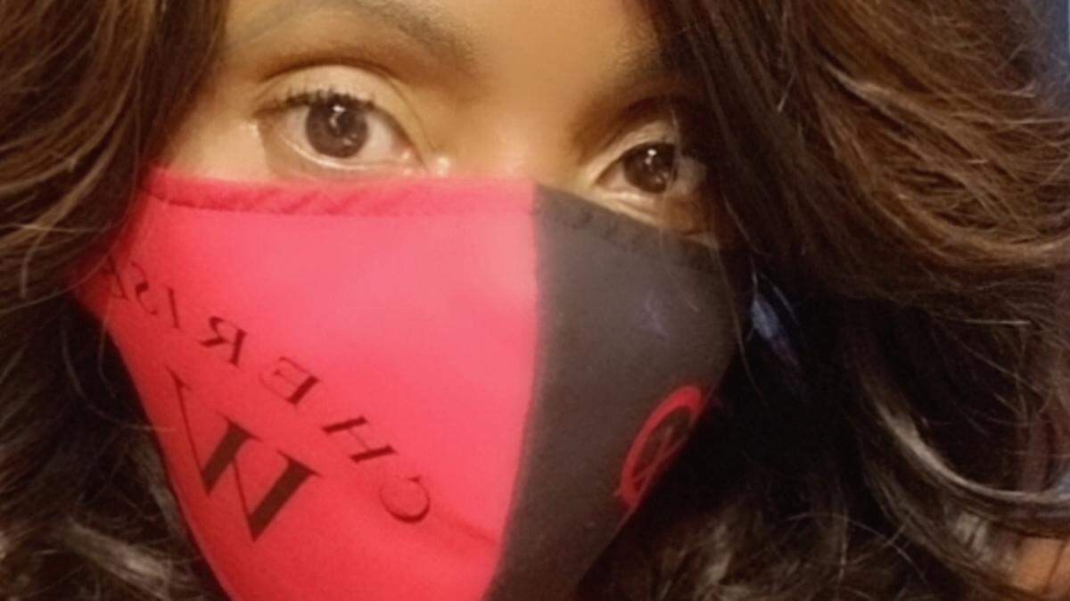 Cherise Walker received her custom-made mask from a small business owner, Sir Fitz’Gerald.
