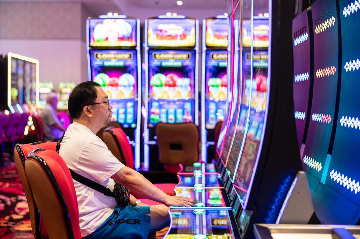 A man gambles during the opening of the first part of the Catawba Indians' Catawba Two Kings Casino in Kings Mountain, N.C., on Wednesday, May 20, 2026. 