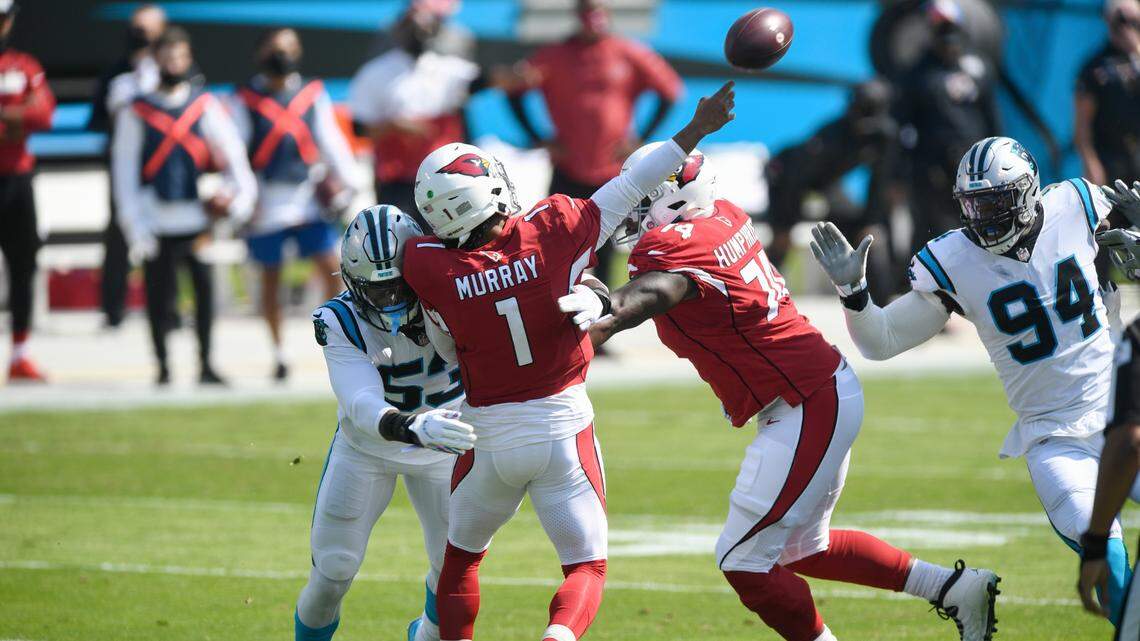 Carolina Panthers defensive end Brian Burns (53) takes down Arizona Cardinals quarterback Kyler Murray (1) Bank of America Stadium in Charlotte, NC on Sunday, October 4, 2020.