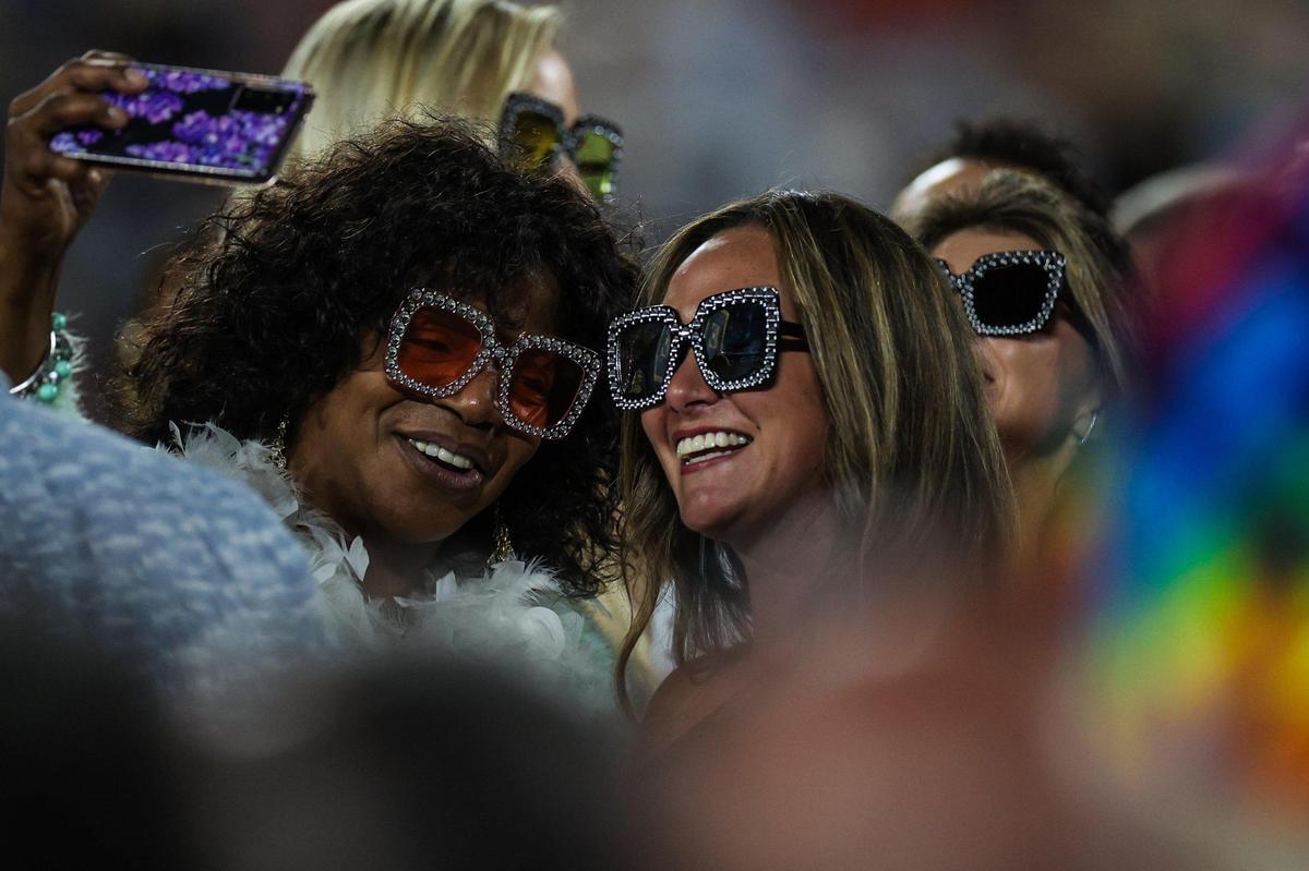 Concert goers don oversized, rhinestone-studded eyewear inspired by music artist Elton John, who performed at Bank of America Stadium during his Farewell Yellow Brick Road tour on Sunday, September 18, 2022 in Charlotte, NC.