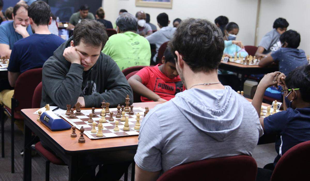 Players often gain skills online, then move to in-person events, Peter Giannatos of the Charlotte Chess Center said.
