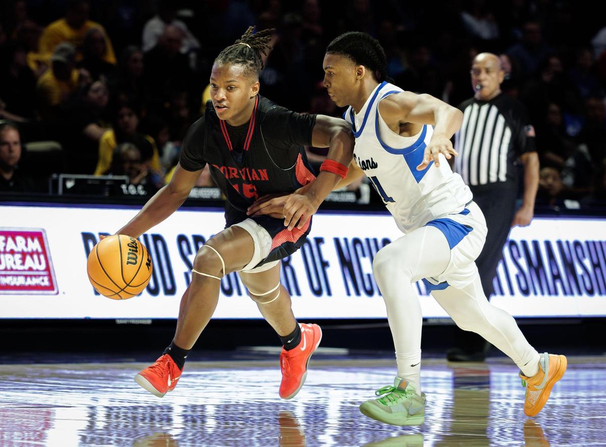 Corvian’s Andre Jackson Jr. (left) drives the lane during late 1st half action. Corvian would play Southern Wake in the 1A Men’s Basketball NCHSAA Championship Friday 14, 2025.