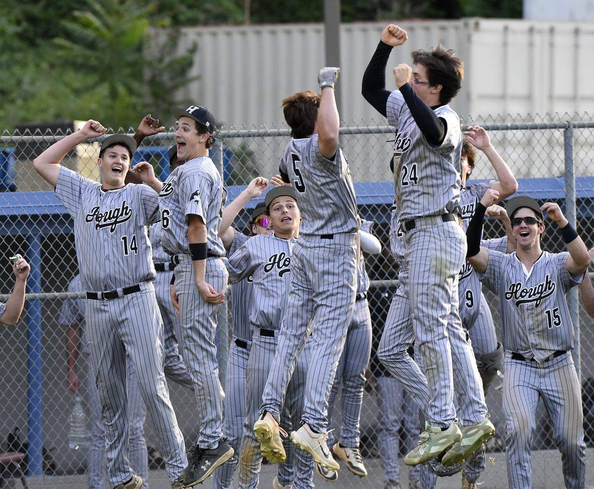 Hough High’s #5, Harrison Sheets, who had a multi-hit game Thursday is congratulated by his teammates after a homer extending Hough’s lead. Hough defeated Myers Park 10-2 for the Greater Charlotte Baseball Championship at Garinger High School on Thursday, April 30th, 2026.