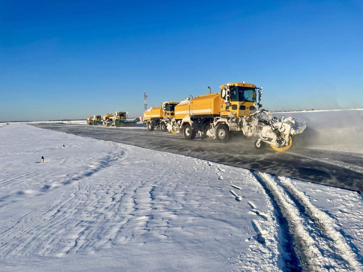 Charlotte Douglas International Airport dealt with record snowfall over the weekend. Crews from American Airlines assisted with the snow removal process for its operations. 