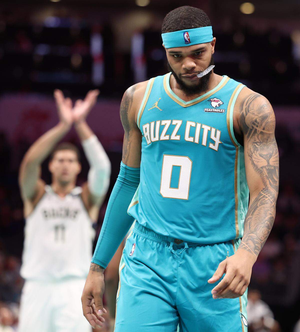 Charlotte Hornets forward Miles Bridges returned to NBA action following a suspension on Friday, November 17, 2023. The Hornets hosted the Milwaukee Bucks at Spectrum Center in Charlotte, NC.