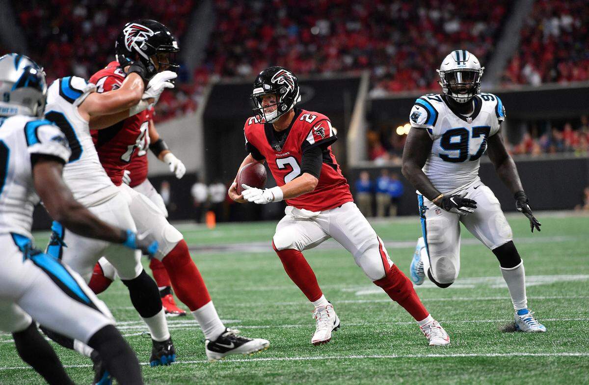 Atlanta Falcons quarterback Matt Ryan (2) runs against the Carolina Panthers during the second half of an NFL football game, Sunday, Sept. 16, 2018, in Atlanta. Ryan, a pocket passer, scored a career-best two rushing touchdowns against Carolina. (AP Photo/John Amis)