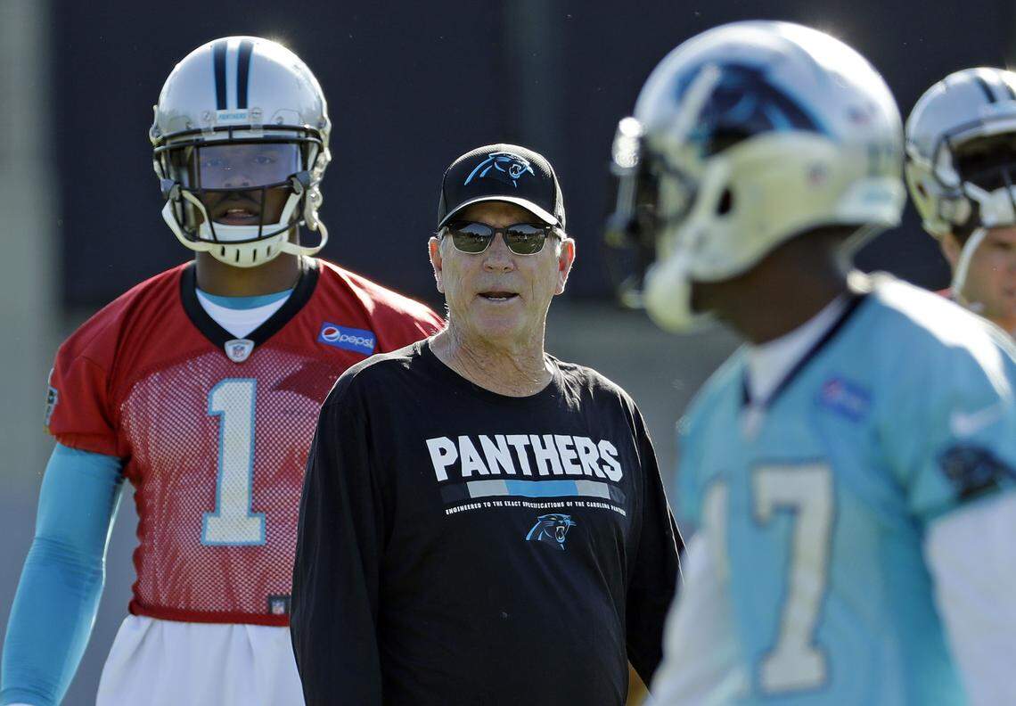 New Carolina Panthers offensive coordinator Norv Turner, center, will try to get Cam Newton (1) playing close to his MVP form of 2015 with the help of wide receiver Devin Funchess (17).