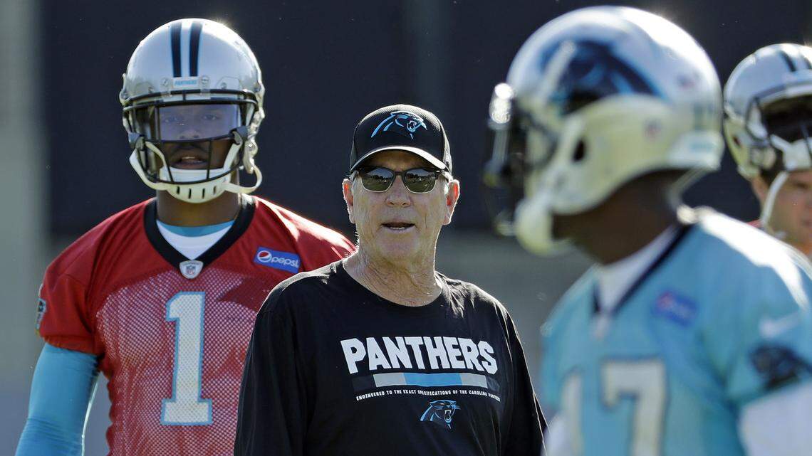 New Carolina Panthers offensive coordinator Norv Turner, center, will try to get Cam Newton (1) playing close to his MVP form of 2015 with the help of wide receiver Devin Funchess (17).