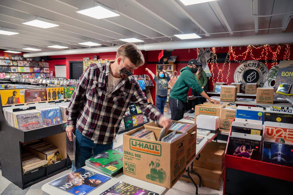 A customer sifts through the offerings at Lunchbox Records.