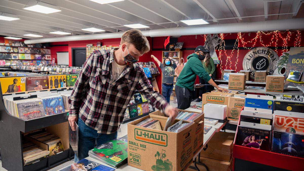 A customer sifts through the offerings at Lunchbox Records.