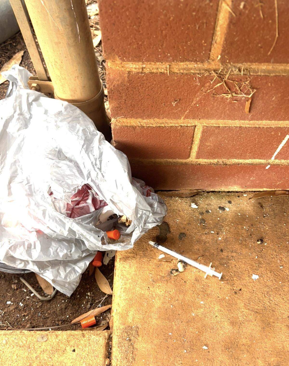 Debris and seemingly a syringe found at the former Smith Family Center the week of Feb. 16, 2026