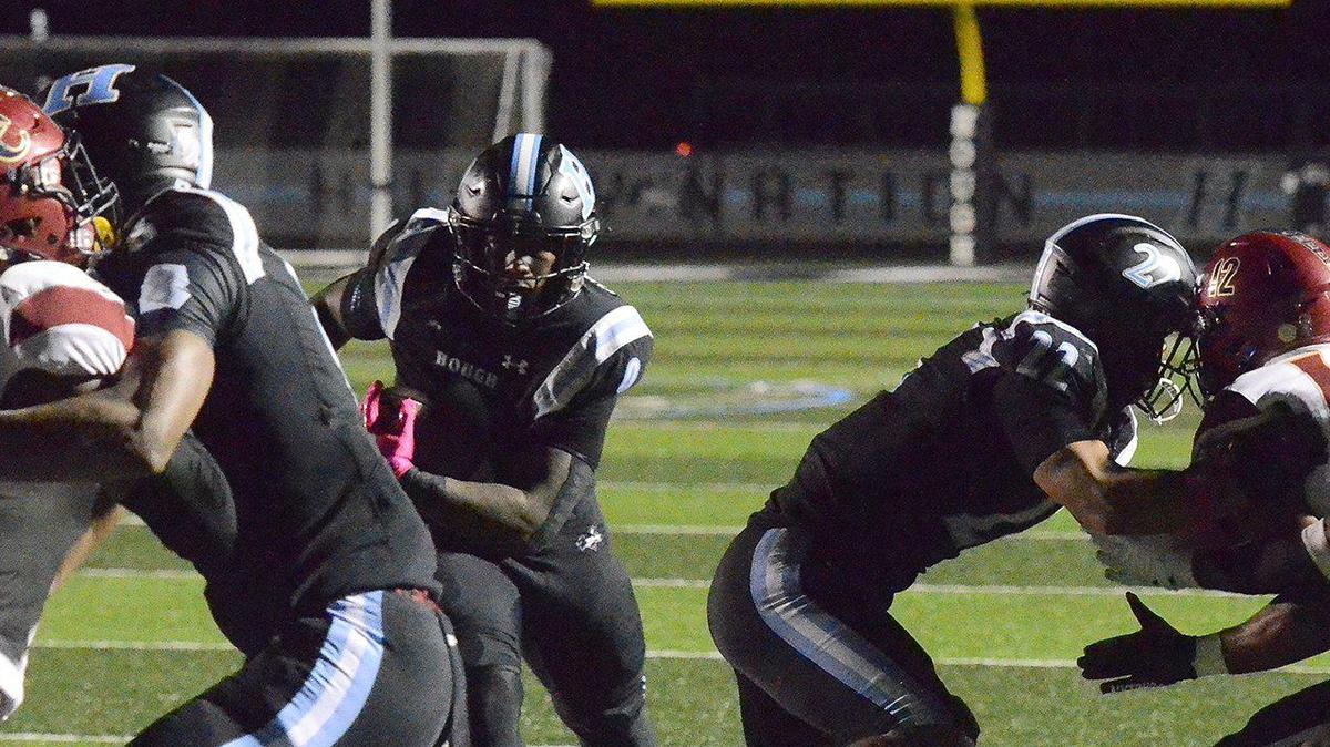 Hough High running back, #0, Jamison Funderback rushes for a first half touchdown. Sweet 16 #5, Mallard Creek trailed #3, Hough19-0 at halftime in a high stakes football game on Friday, Oct. 18, 2024.