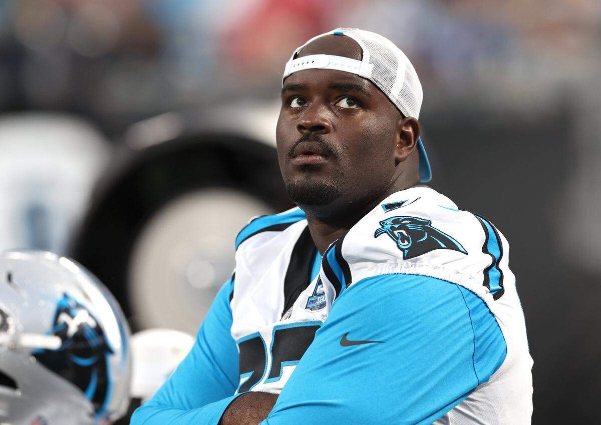Carolina Panthers tackle Taylor Moton stands along the team’s sideline during second quarter action against the New York Jets at Bank of America Stadium in Charlotte, NC on Saturday, August 17, 2024.