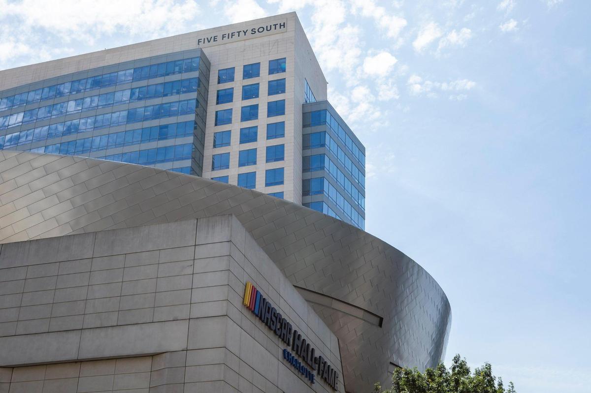 A new sign reading “550 South” is displayed on the NASCAR building in uptown on Tuesday, June 17, 2022 in Charlotte, NC. Last week Cousins, the building’s management company, removed the large NASCAR signs at the top of the building. The building formerly known as “NASCAR Plaza” is now rebranded “550 South”