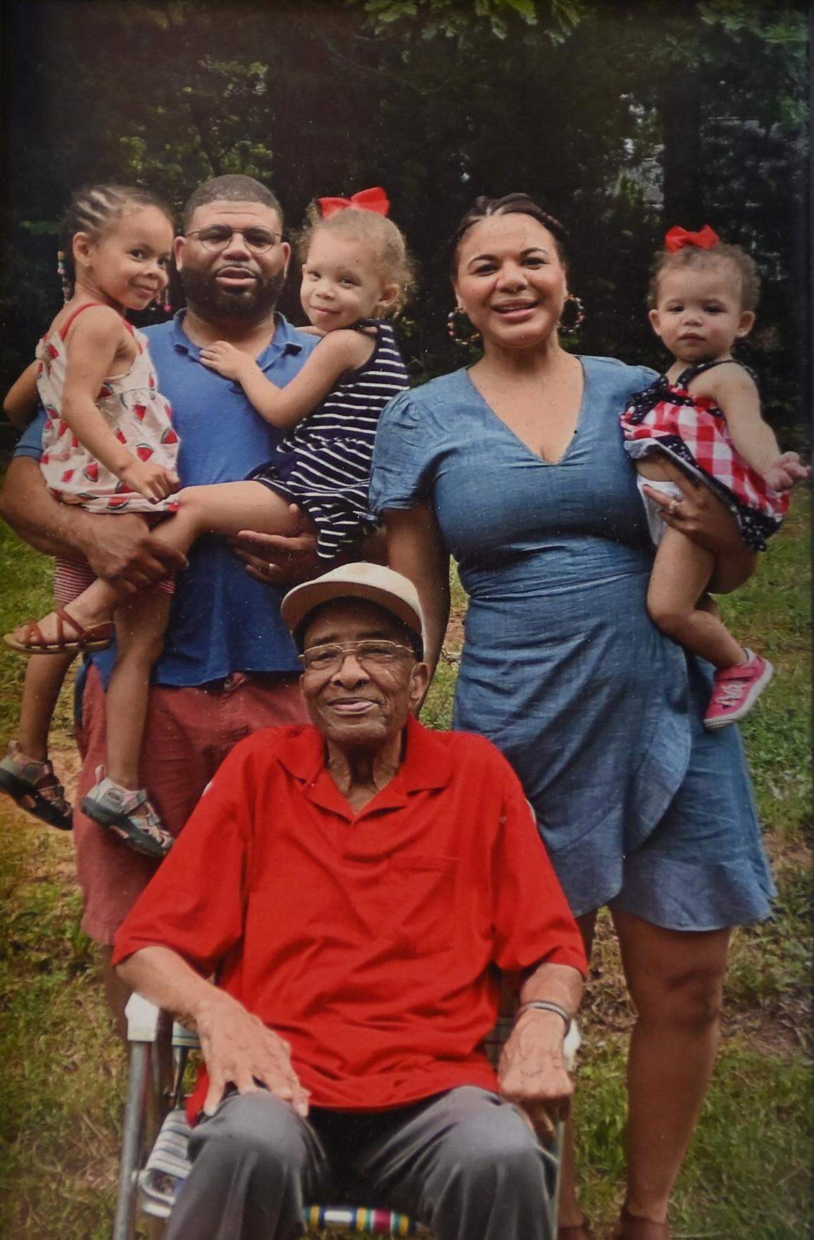 A family photo, featuring Vi Lyles’ two children, three of her four grandchildren, and her first husband’s father, Romeo Alexander.