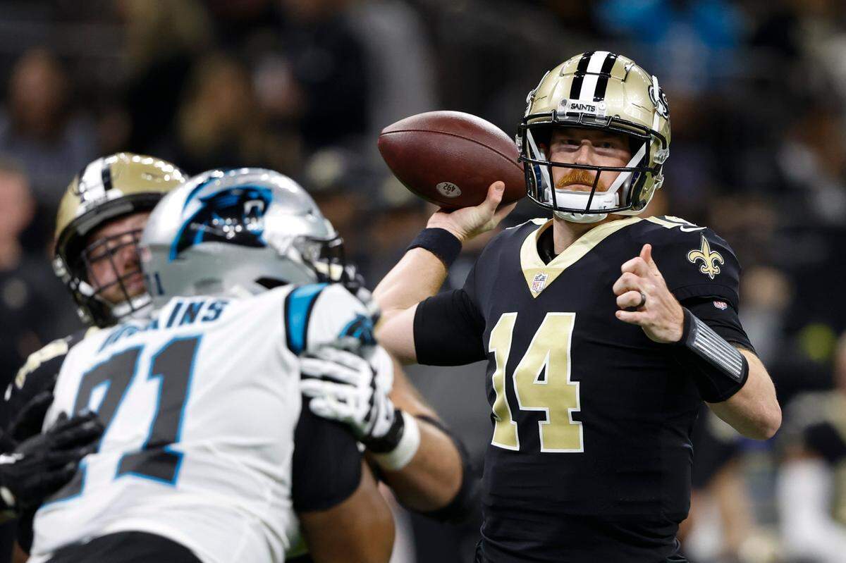 New Orleans Saints quarterback Andy Dalton passes during the first half an NFL football game between the Carolina Panthers and the New Orleans Saints in New Orleans, Sunday, Jan. 8, 2023. (AP Photo/Butch Dill)