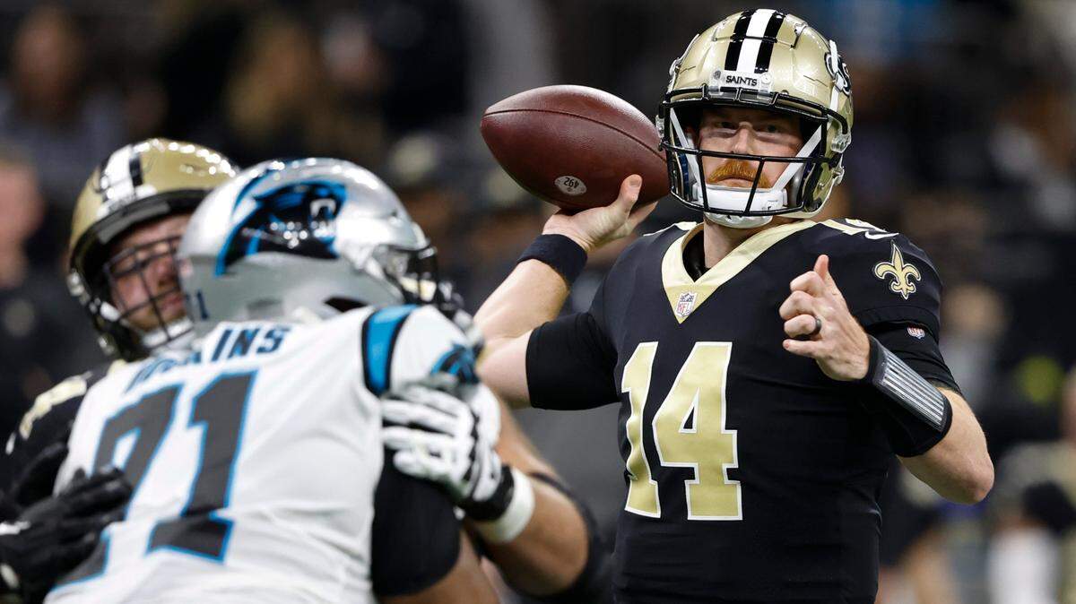 New Orleans Saints quarterback Andy Dalton passes during the first half an NFL football game between the Carolina Panthers and the New Orleans Saints in New Orleans, Sunday, Jan. 8, 2023. (AP Photo/Butch Dill)