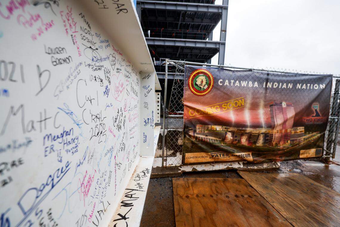 Members of the Catawba Nation signed the ceremonial beam that will be the centerpiece of the “topping off” ceremony on Monday, Oct. 27, for their $1 billion Catawba Two Kings Casino. A crane operator placed the beam on top of the complex’s permanent casino. The project’s “introductory casino” is scheduled to open in spring 2026. 