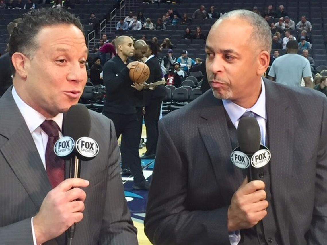 Eric Collins (left) and Dell Curry have called Charlotte Hornets games together since 2015. Collins says he likes to thread his broadcasts with a sense of “joy and wonder.”