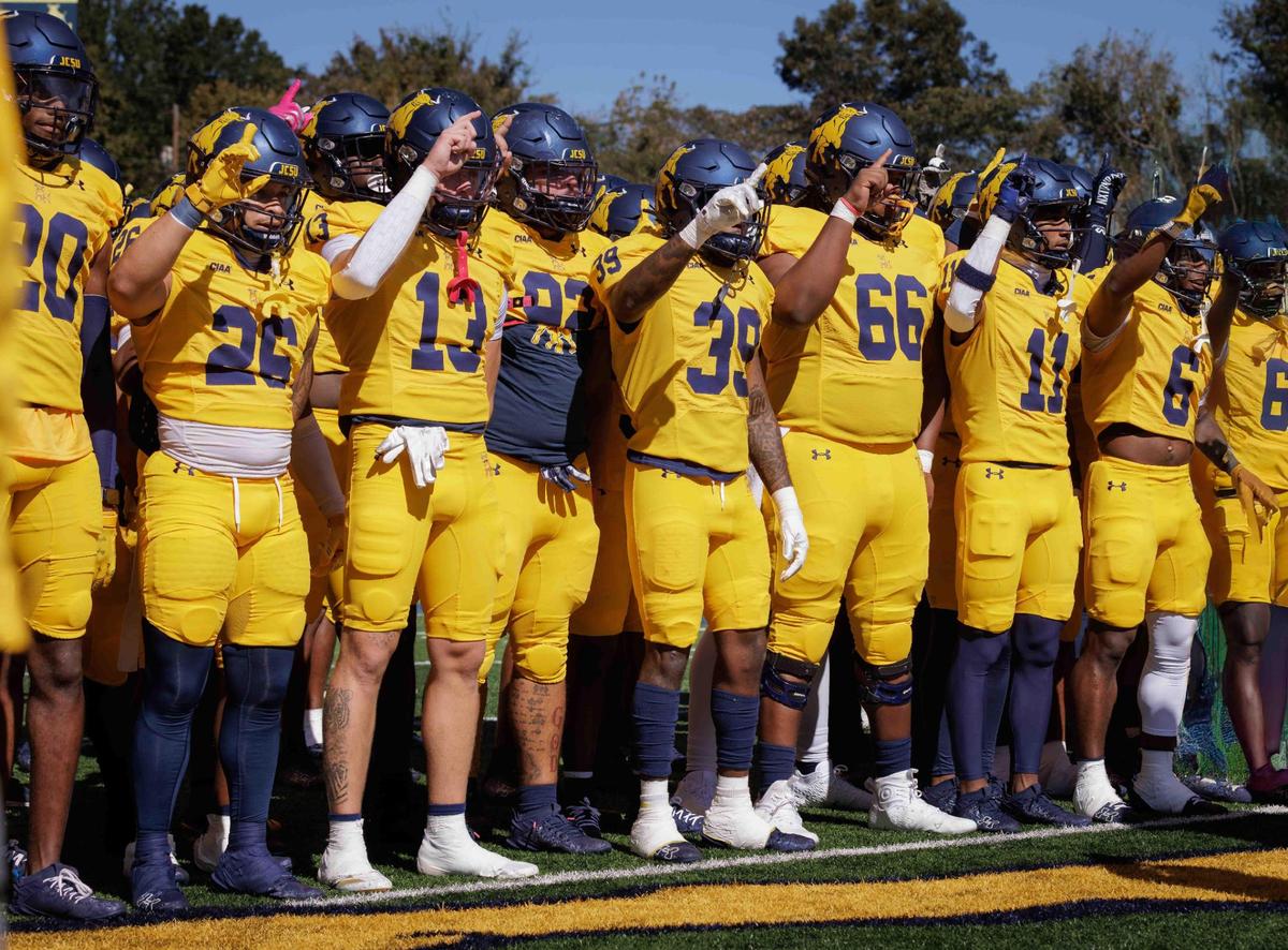 Johnson C. Smith Golden Bulls players cheer before the game. The Bulls go to 7-0 as they defeat Shaw University 21-14 Saturday October 19, 2024.